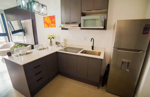 Barrio Escalante Apartment | Sölstice Studio | Urban sunset at Bö Escalante