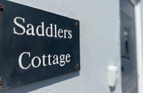 St. Florence House | Saddlers Cottage with indoor pool, tennis court and lots more Tenby area