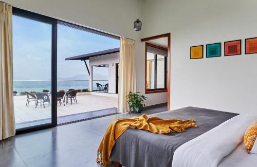 Lonavala Villa | SaffronStays Ahilya Waters by Kosha Villas, Pawna - pool villa with panoramic view of Pawna Lake