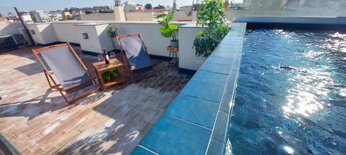 San Julian Apartment | San Luis Downtown & Pool Apartment