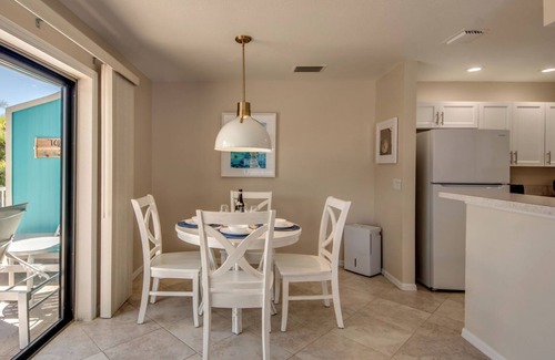 South Island House | Sand Dollar #3: Upstairs Canalfront & Pet Friendly with Pool by the Beach!