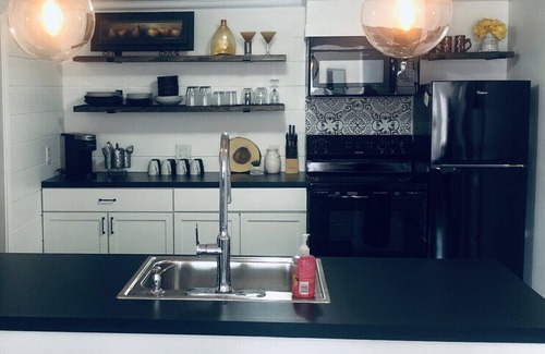 Grand Haven Apartment | Sand suite is perfect for summer fun! Pets considered with fee.