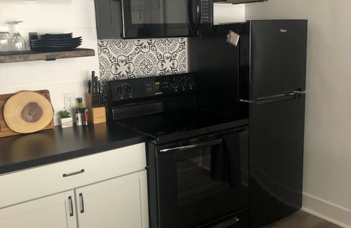 Grand Haven Apartment | Sand suite is perfect for summer fun! Pets considered with fee.