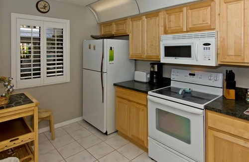 Cocoa Beach Condo | Sandcastles 113 is just steps to the pool and the beach