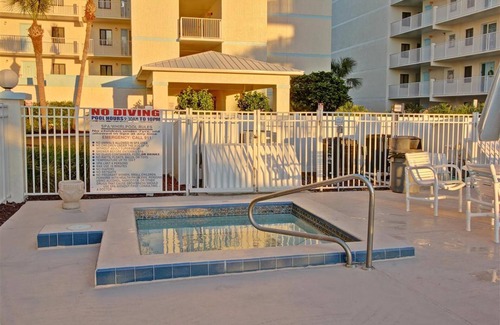 Cocoa Beach Condo | Sandcastles 113 is just steps to the pool and the beach