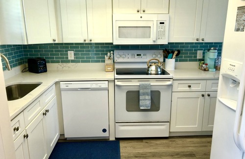 New Melbourne Beach Cottage | Sandpiper Suite 1: Find Serenity on private Melbourne Beach - Oceanfront style