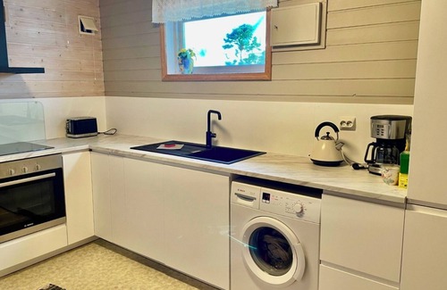 Sandve Apartment | Sandve, spacious apartment, in quiet neighborhood. Sea view.