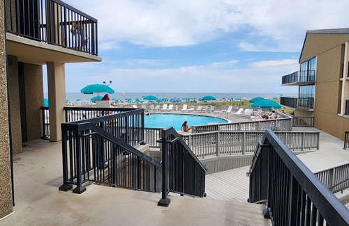 Bethany Beach Condo | Sea Colony garden condo steps to pool & ocean and only a short walk to town.