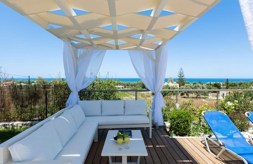 Adelianos Kampos Villa | Sea view, full privacy, walking distance to a sandy beach and shops!