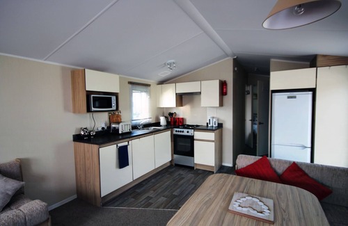 Mudeford House | 'Seascape' - pet friendly and by the beach on Sandhills Holiday Park, Mudeford