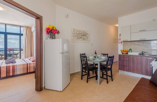 Bugibba Apartment | Seashells 2 bedroom Apartment with sunny terrace with stunning panoramic sea views by Getaways Malta