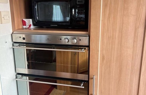 Llanrhystud House | Seaside Bliss for the Family: Spacious Caravan by the Sea, Sleeps 4, Perfect for Kids