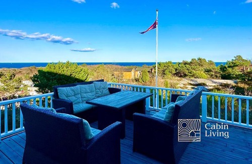 Lillesand House | Seaside cabin with terrace and ocean view