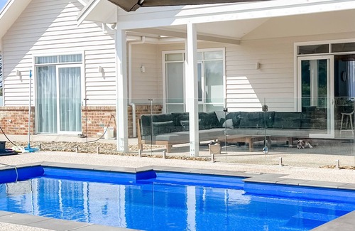 Indented Head House | Seaside Country Retreat w/magnesium pool and red brick fire place