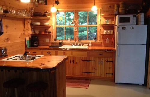 Greenville Cabin | Secluded Home Nestled On The Shore of Wilson Pond