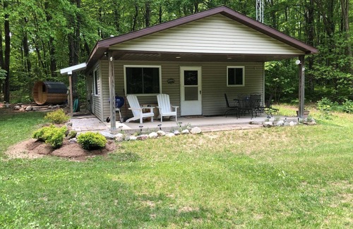 White Cloud House | Secluded Wilderness Cabin With Hiking Trail, Fire Pit, and Sauna