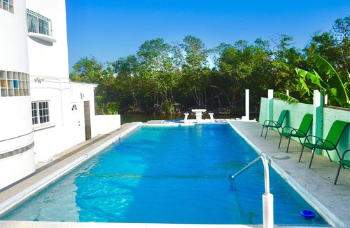 Belize City Apartment | See Belize TRANQUIL Sea View 2nd Floor Studio with Pool and Overwater Deck