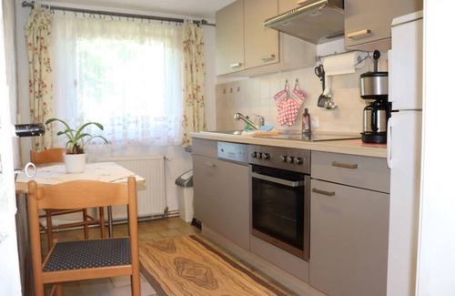 Born auf dem Darss House | Semi-detached house with fireplace near the Bodden, central but quiet location