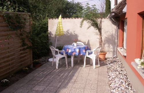 Born auf dem Darss House | Semi-detached house with fireplace near the Bodden, central but quiet location