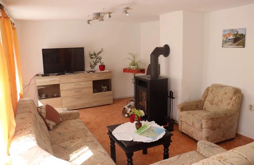 Born auf dem Darss House | Semi-detached house with fireplace near the Bodden, central but quiet location