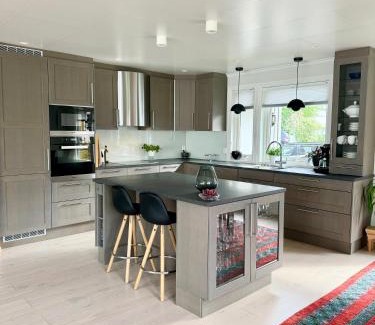 Bodo Villa | Sentrumsnær og tilbaketrukket villa!