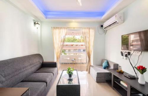 Colva Apartment | Serene Escape One Bedroom Apartment with AC, Wi-Fi, Gym and 5-Minute Walk to the Beach Cativating Tree and Garden Views