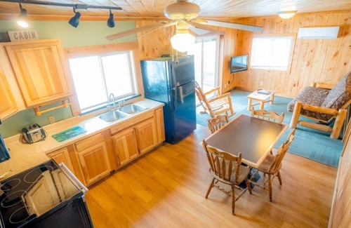 Puposky Cabin | Serene Lakefront Cabin - Steps from Big Turtle Lake