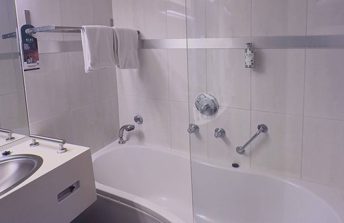 Made Hotel | Serene Made Getaway Steps from Local Dining, National & Theme Park Adventures