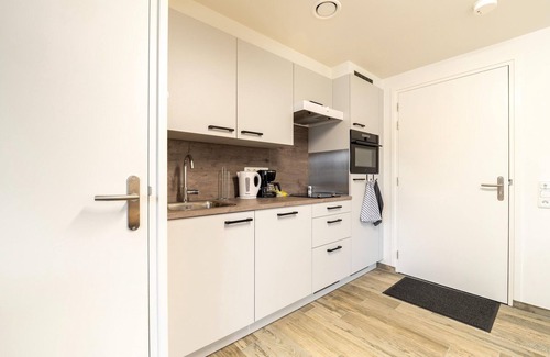 Eikske Apartment | Serene Stay with All You Need