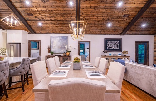 Broken Bow Cabin | Serengeti features three king master suites and bunk room bordering National Forest