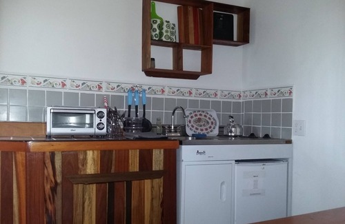 Unitedville Cabin | Set in the jungle, Ginger Lily is a self catering 1 bedroom cabin featuring A/C