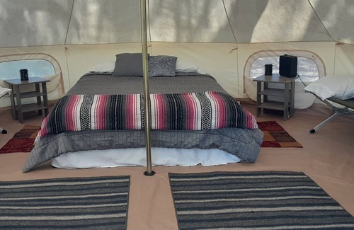 Spring Branch RV Rental | Shady Oaks Glamping Tent Queen Bed, 2 Cots, AC and Electricity
