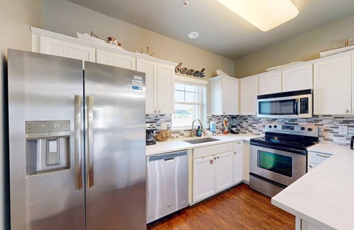 Safe Harbor Condo | Shared Pool and Hot Tub, Garage, Golf Cart Access, Pet Friendly