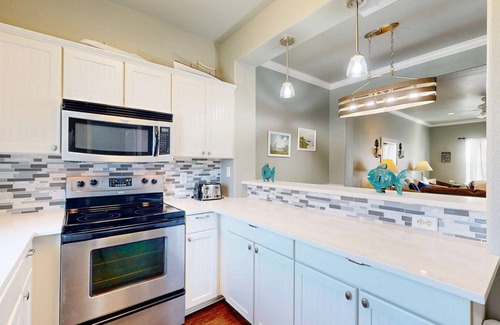 Safe Harbor Condo | Shared Pool and Hot Tub, Garage, Golf Cart Access, Pet Friendly