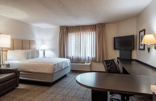 Park Central Hotel | Short Drive to The Dallas Arboretum and Botanical Garden! FREE Parking Onsite!