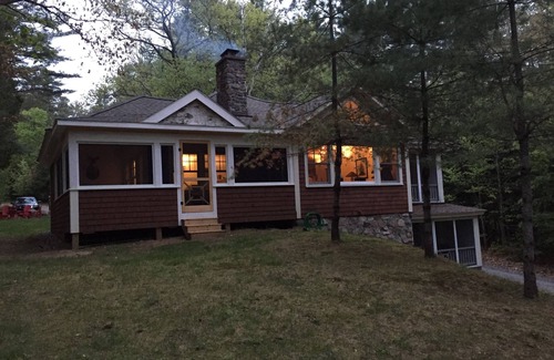 Lake Placid Club House | Short walk to village.with private wooded setting. EV Charger in parking area.