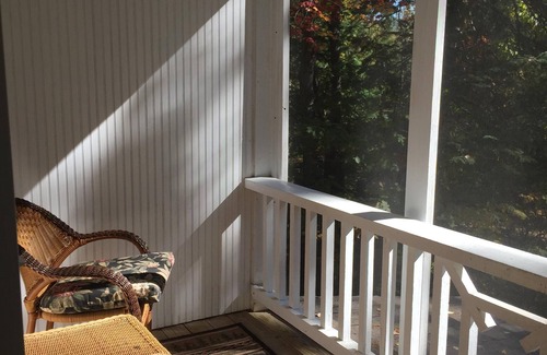 Lake Placid Club House | Short walk to village.with private wooded setting. EV Charger in parking area.