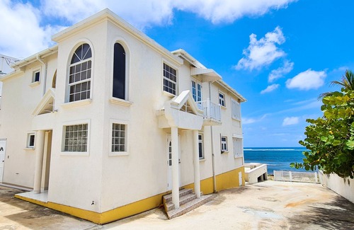 Silver Sands Apartment | Silver Sands Beachfront Condo, Indoor & Outdoor Dining, Shared Patio - Bar & BBQ