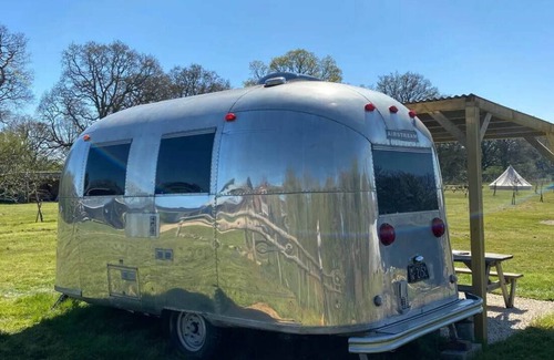 Gumley House | Silverbird Glamping Airstream Caravan and private deck