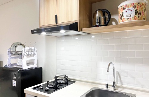 South Tambun Apartment | Simple Studio At Lrt City Bekasi Apartment By Travelio