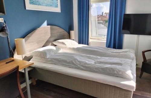 Kristiansand Hotel | Sjøgløtt Gjestgiveri