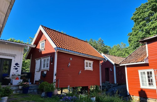 Jomfruland Cabin | Sjarmerende Stabbur i Hjertet av Kragerø Skjærgård
