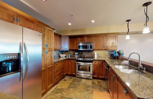 Big White Ski Resort House | Ski-in/ski-out condo with private hot tub, WiFi, fireplace, & private grill