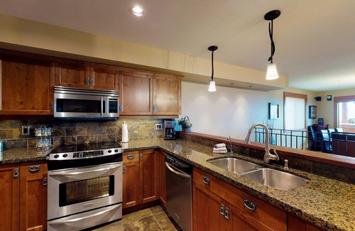 Big White Ski Resort House | Ski-in/ski-out condo with private hot tub, WiFi, fireplace, & private grill