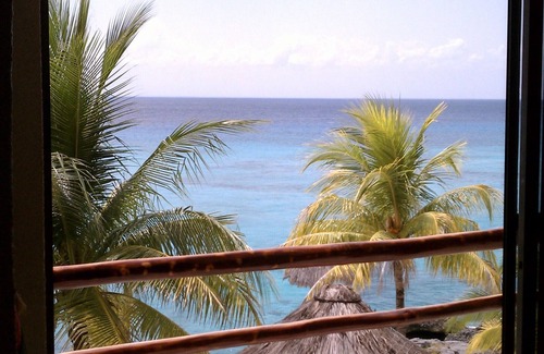 San Miguel Condo | Small is Beautiful. Relax ON the beach, convenient & near the Presidential Villa