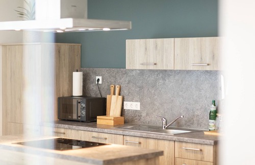 Bad Zwischenahn Apartment | SmartFewo: Windbrecher | terrace | sauna | parking