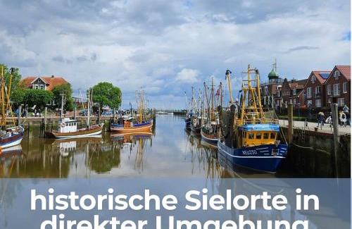 Altfunnixsiel House | Smittshörn 3 - Nordsee Ferienhaus für Gruppen und Familien mit eingezäunten Garten