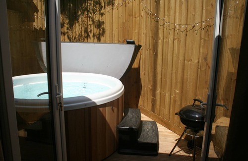 Mawr Cottage | Snow White's House - Farm Park Stay with Hot Tub, BBQ & Fire Pit