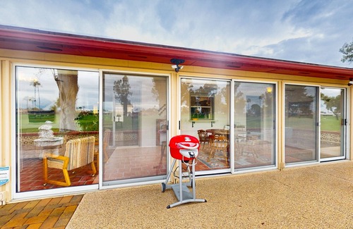 Sunland Village House | Snowbird-friendly golf-front home with pool, hot tub, grill, smart TVs, W/D, AC