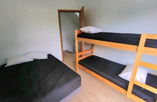 Guaratuba House | Sobrado Novo n 02 com Terraço Panorâmico e Churrasqueira - 4 min a pe ate a Praia - Condomínio Sobre as Ondas